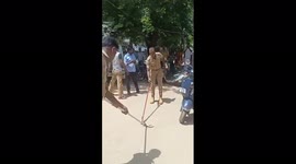 Firefighters in southern India remove deadly cobra from motorbike