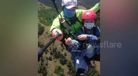 Paraglider drops phone hundreds of metres taking selfie gone wrong