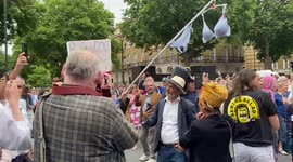 Protesters play “The Bye Bye Boris Song” as Boris Johnson announces resignation