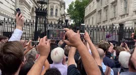 Crowds boo Boris Johnson as he announces his resignation