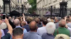 Protesters outside Downing Street shout 'liar' as Boris Johnson announces his resignation