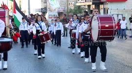 Palestinian scout bands parade ahead of the Muslim festival of sacrifice Eid al-Adha