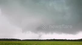 Stationary storm dropping a tornado on the ground near Shantz, Alberta.