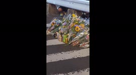 Japan: Mourners lay flowers at scene of Shinzo Abe shooting