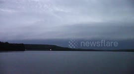 Giant ominous shelf cloud approaches at dusk over western Pennsylvania