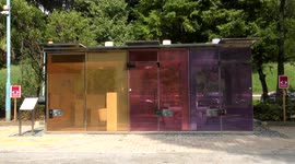 New public toilets with transparent walls at Yoyogi Fukamachi Mini Park in Shibuya Ward.
