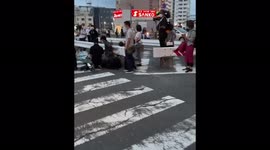 Japan: People Laying Flowers Where Former PM Shinzo Abe Was Assassinated 2