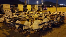 Muslim pilgrims collect stones on their way to Jamarat to stone the devil as part of the annual Islamic Hajj pilgrimage during the first day of Eid Al Adha