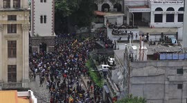 Gun shots fired to air while Sri Lanka protesters break into President's House as thousands rally