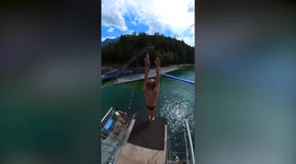 Talented teen diver makes a splash with an incredible 15m (50ft) dive from a springboard