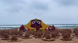 The sand artist made a beautiful sand sculpture crafts captivating 125 sand chariots on puri beach