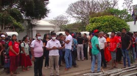 Fed-up Sri Lankans force government resignations by occupying president and prime minister's residence