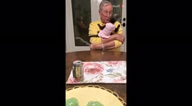 Baby monkey becomes super-friendly with human grandparents at first meeting