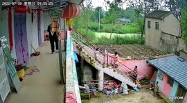 Elderly woman uses wooden stick to save grandson from electric shock in China