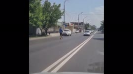 Reckless Russian man rides rental scooter into oncoming traffic
