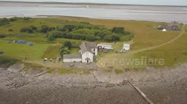 UK electrician becomes landlord of pub on tiny island off British coast as well as its 'KING'