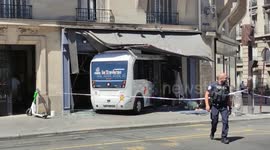 At least 7 injured after minibus crashes into central Paris shop