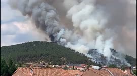Hundreds evacuated after wildfire breaks out in Madrid region of Spain