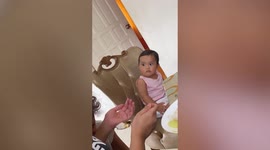Jealous toddler has hilarious angry face when friend cuddles her favourite auntie