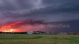 US: Surreal Fiery Sunset And Menacing Storm Shelf Cloud In Minnesota