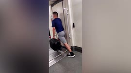 Man uses suitcase to work out on train in China