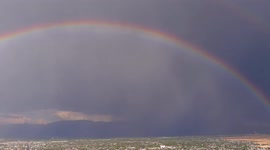 Massive double rainbow hangs over Salt Lake Valley in Utah
