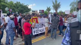 Sri Lankans living in the Maldives protest against arrival of President Rajapaksa