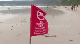 British tourist, 34, dies on honeymoon after 'ignoring red warning flag' to go swimming on Thai beach