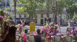 Patriotic scene during military parade on Bastille Day in Paris, France