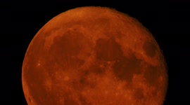 Stunning close-up of Buck Supermoon with two jets seen rising in Kent, UK