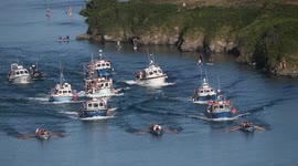 Historic Cornish pilot gig rowing boats compete in the heatwave conditions in an open sea race for the historic Atkinson trophy UK