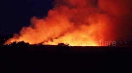 Dried out grass catches fire at model plane show in Kent, UK