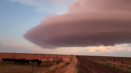 Huge supercell cloud forms above fields in Kansas