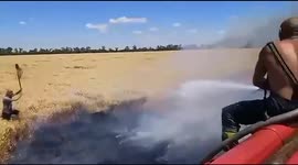 Ukrainian farmers struggle with wheat blaze caused by Russian troops