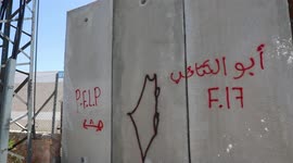 Israel's controversial separation barrier seen around settlement