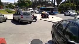 Man wrestles escaped bull to floor in Malaga