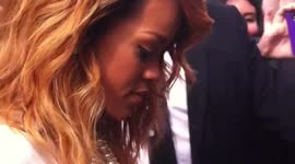 Rihanna gets booed at the Chanel show in Paris for the Fashion Week 2013