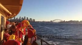 Lions fans on Sydney Harbour