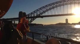 Lions fans on the Sydney Ferry in Sydney Harbour during the Lions Tour