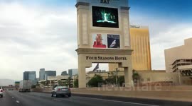 Henderson Thru Las Vegas Strip Resort Corridor with Smoke/Fire in distance.