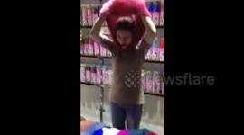 Girl demonstrates ten ways to dress with ONE item of clothing