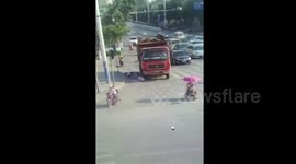 Three girls on scooter survive crash into truck