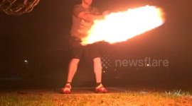 Man imitates ancient Olympics with flaming hammer throw