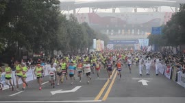 A women wears wedding dress to run a marathon