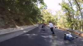 Man has nasty crash during downhill longboard ride