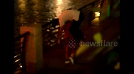 Woman heroically fireman carries drunk man to safety
