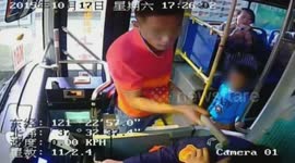 Man beats bus driver with mop in front of his son
