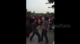 Hilarious dancing 'aunties' in Chinese square