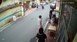 Three-wheeler drive by toddler smashes through shop's glass door in China