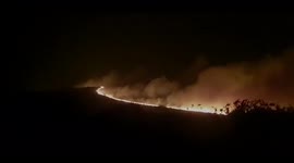 Wildfire burns through western France, triggering evacutions